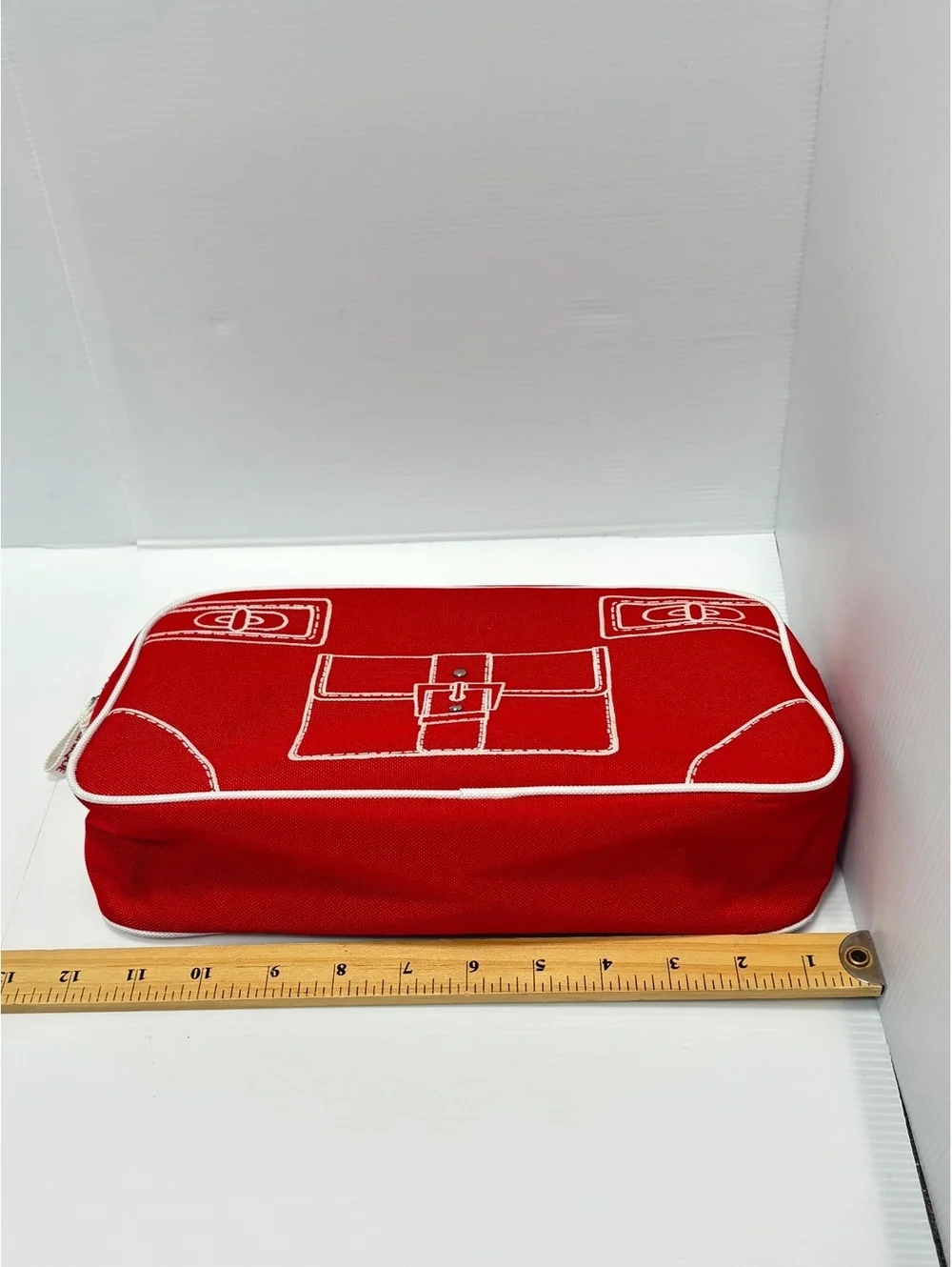Clinique Red Canvas Cosmetic Bag with White Image Stitching and Zipper Closure